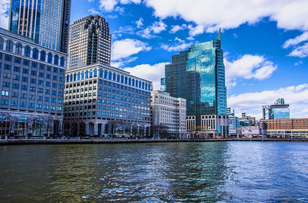 Jersey City Docks, buildings reflected on water.
