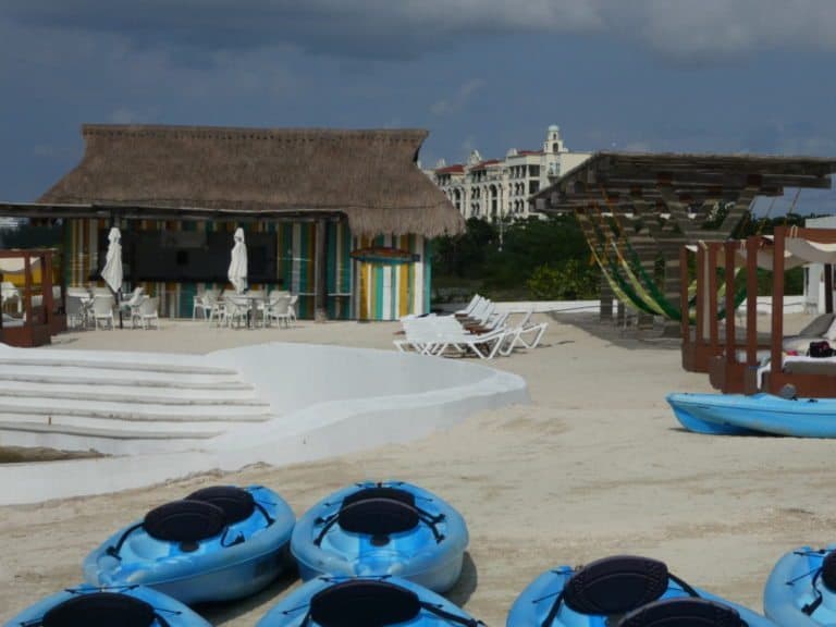 Explorean Cozumel beach bar and beach hammocks